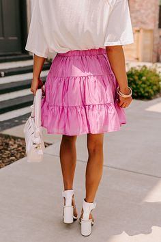 - This airy skirt is so on trend! - Fully lined, ultra lightweight material - An elastic waistline - A flowy skirt that ends in a straight mid-thigh length hemline Flowy Pleated Skirt For Brunch, Feminine Flowy Ruffled Skirt, Chic Flowy Pink Skirt, Flowy Skirt For Brunch, Flowy Pleated Brunch Skirt, Flowy Tiered Skirt For Brunch, Trendy Flowy Skirt For Brunch, Chic Mini Skirt With Elastic Waistband For Day Out, Chic Flowy Ruffled Skirt