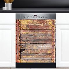 an oven door is open in the kitchen