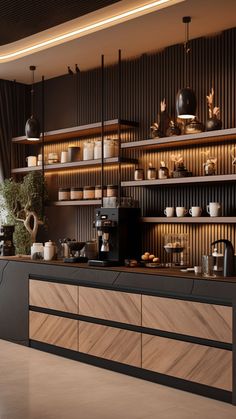 a coffee shop with lots of counter space and shelves filled with cups, mugs and saucers