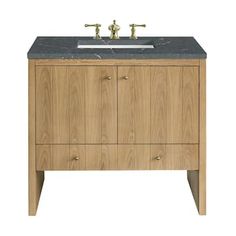 a bathroom vanity with marble top and two faucets on the sink, against a white background