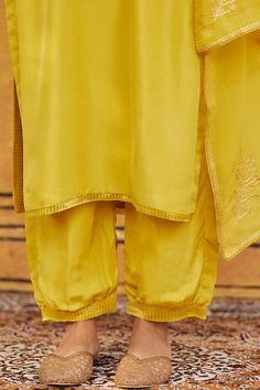 Yellow straight kurta with floral tilla hand embroidery. Comes with salwar pant and embroidered bordered dupatta. - Aza Fashions Silk Sets With Resham Embroidery And Straight Pants, Anarkali Salwar Kameez With Straight Pants, Anarkali Salwar Kameez With Straight Pants And Dupatta, Traditional Silk Sets With Straight Pants, Festive Anarkali Set With Straight Pants, Traditional Festive Sets With Straight Pants, Festive Straight Pants Kurta With Embroidered Border, Traditional Palazzo Set With Dupatta And Straight Pants, Silk Sets With Dupatta And Straight Pants