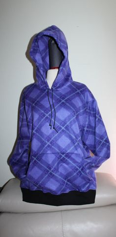 This is a Handmade Unisex Fleece Hoodie with Front Pocket Sweatshirt with Hood.  Purple and Black Plaid. So warm and soft for YOU! This hoodie will hug you during the cold weather. It is size Men M or Woman L. The pocket is big and you can even warm your hands there. Measures:   25 inch armpit to armpit                      26 inch length. Because of the pandemic, I used to make masks to donate, but now everybody can buy them anywhere. So I decided to make hoodies because they are so comfortable and you can wear them for almost any activity. They are cozy and made you fell warm. Warm Purple, Plaid Hoodie, Black Plaid, Purple Black, Fleece Hoodie, Purple And Black, Front Pocket, Streetwear Fashion, Adult Outfits