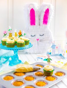 there are cupcakes that have been placed on the table