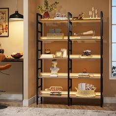 an empty shelf in the corner of a room with various items on it and a chair next to it