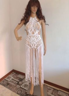 This is an exclusive white macrame dress from Italy made of high-quality lurex (3mm) thread. In our macrame store all the models that you will come across are sole and will not be mass produced. Moreover, our models are not based on existing designs and are created based on unique patterns. If you are one of those individuals who is tired of looking normal this unique dress will make you stand out from the crowd and help you to be always in the center of attention.  THE SIZE GUIDE OF WHITE MACRA White Crochet Beachwear Dress, Elegant White Crochet Beach Cover-up Dress, White Crochet Maxi Dress For Party, Elegant White Crochet Beach Dress, Elegant White Crochet Dress For Beach, White Fitted Maxi Dress For Festival, Fitted White Maxi Dress For Festival, White Bohemian Crochet Maxi Dress, White Crochet Maxi Dress For Beach