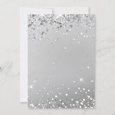 a card with silver glitter on it