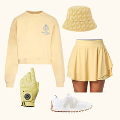 a yellow outfit with white shoes and a hat