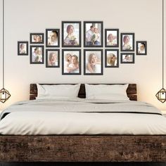 a bed with pictures hanging on the wall above it