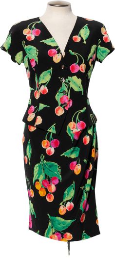 Beautiful and bright multicolor cherry print on black fabric. Shortsleeve and features two small pockets on the front. The skirt has the iconic asymmetrical faux wrap ruching detail that Ungaro is known for. Tag size 8TopBust 37”Waist 30”Shoulders 17”Length About 20”Skirt Waist 27.75”Hips 38”Length 23”Good vintage condition. There is small wear to the lining of the skirt and a few pulls near the hem of the skirt. Not visible when worn. Fitted Cotton Dress With Cherry Print, Red Slim Fit Printed Skirt, Vintage Cherry Print Dresses For Spring, Spring White T-shirt With Cherry Print, Stand User, Cherry Print Dress, Smocked Skirt, Non-stretch Multicolor Floral Print Skirt, Purple Skirt