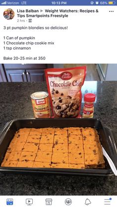 a pan filled with food sitting on top of a counter