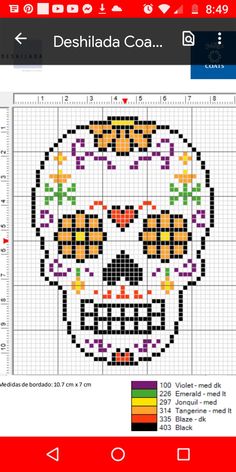 a cross stitch pattern with a skull on it