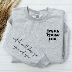 Jesus Chose You Sweatshirt, Sleeve Print Religious Women Sweatshirt, Christian Clothes For Mom, Choose You Again Sweatshirt, Faith Sweatshirt HOW TO ORDER 1-) Please, check and review all the photos. 2-) Select Your Size and Color from drop down menus. 3-) Click add to cart. You can go back to add more sweatshirts. 4-) Click "Proceed to check out" to purchase your order. 5-) When you check out, you can add a note to seller for any request. SIZING We are using Unisex sizing sweatshirts for a casual and relaxed fit. That means they run slightly larger than typical women's one and slightly smaller than typical men's ones. ✔ Please refer to the size chart style before you place your order to find the right fit for your style. ABOUT UNISEX SWEATSHIRTS Unisex Sweatshirt fits like a well-loved fa Cricut Sweatshirt Ideas Women, Christian Items, Christian Clothes, Faith Sweatshirt, Christian Shirts Designs, Sweater Ideas, Sweatshirt Fits, Faith Clothing, Nails Today