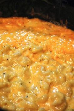 macaroni and cheese is being cooked in an oven