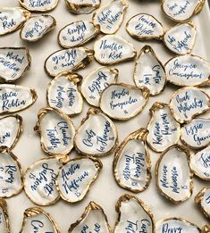 a tray filled with lots of cookies covered in writing