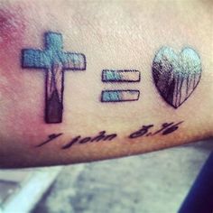 a cross and heart with the words jesus - love on it, written in black ink