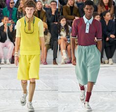 Lacoste 2022 Spring Summer Mens Runway Looks Collection - Mode à Paris Fashion Week France - Sporty Casual Athleisure Sleeveless Tank Top Straps Belts Cords Tied Knot Mesh Neoprene Tennis Shirt Knit Sweater Threads Logo Frayed Raw Hem Stripes Logo Patchwork Anorak Coat Parka Hoodie Trackwear Track Jacket Shorts Socks Slippers Sliders Trainers Sneakers