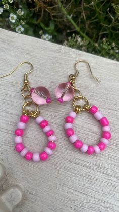 Hand made beaded hoop earrings Trendy Pink Dangle Jewelry, Pink Beaded Jewelry For Jewelry Making, Trendy Round Beaded Earrings With Ear Wire, Trendy Small Hoop Earrings With Dangling Beads, Pink Beaded Earrings For Summer, Pink Wire Wrapped Jewelry For Jewelry Making, Handmade Pink Jewelry With Round Beads, Round Pink Earrings For Jewelry Making, Trendy Pink Beaded Earrings For Gift