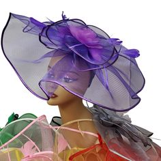 Lady Diane Collection Fascinator Style Style: FA-776 Multiple Color Choices! Topped with satin trim & floral ribbons and flying feather accents Size: Diameter- 13" inches Includes Headband Sign-up for our Rewards Program just go to the icon on right side of this page Follow the instructions, it's quick and easy Spring Party Fascinator With Satin Bow, Summer Party Tulle Headpiece, Summer Party Headpieces Made Of Tulle, Purple Feather Headpieces For Spring, Spring Tulle Fascinator, Spring Party Tulle Headpiece, Purple Fascinator For Spring Party, Summer Fascinator With Ribbon, Spring Party Feather Trim Fascinator