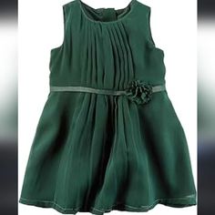 Adorable Green Gem Tone Dress. Color Most True In First Photo. The Lighting Is Weird In The Rest Of My Photos. Never Worn. Just Been On A Hanger. Zipper Back For Easy On And Off. Fully Lined. Attached Belt With Flower Detail. Pleated Front. Beautiful For Baby Wedding Guest, Holiday Photos Or Any Occasion. Size 12 Months. Green Pleated Dress, Green Chiffon Dress, Floral Belt, Santa Suits, Bow Belt, Carters Girl, Unisex Dress