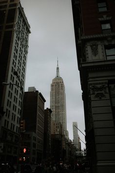 the empire building towering over new york city