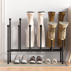 several pairs of shoes are lined up on a shelf in front of a wall mounted shoe rack