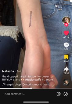 a person with a tattoo on their arm and the word love is written in it