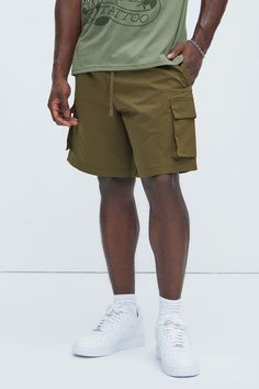 Available In Olive. Elastic Waist Drawstring Side Pockets Back Pocket Cargo Pockets Shell: 100% Polyester Imported California Proposition 65 WARNING: Cancer and Reproductive Harm - www.P65Warnings.ca.gov. | Mens Max Cargo Shorts in Olive Green size Small by Fashion Nova Olive Fashion, Bottom Clothes, Cargo Shorts, Mens Shorts, Fashion Nova, Olive Green, Elastic Waist, California, Size Medium