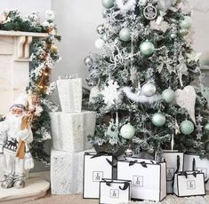 a christmas tree decorated with ornaments and presents