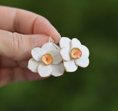 "Daffodil earrings, Wedding jewelry gift for bridesmaids, White flower earrings earrings size - about 1\" (2,5cm) Please, keep the jewellery away from perfume and other alcohol containing fluids because the alcohol damages the Polymer clay. Store the fragile items in separate boxes and treat them with care. Misuse may result in damage. Visit my shop https://www.etsy.com/shop/JewelryByCompliment?ref=l2-shopheader-name If you have any questions, please contact me! Thank your for your visit!" Daffodil Earrings, Flower Earrings Wedding, White Flower Earrings, White Flower Earring, Gift For Bridesmaids, Daisy Jewelry, Floral Jewelry, Earrings Wedding, Floral Jewellery