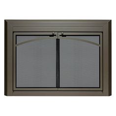 an outdoor fireplace screen with two doors