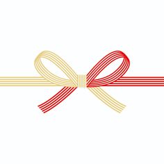 a red and yellow ribbon with a bow on it