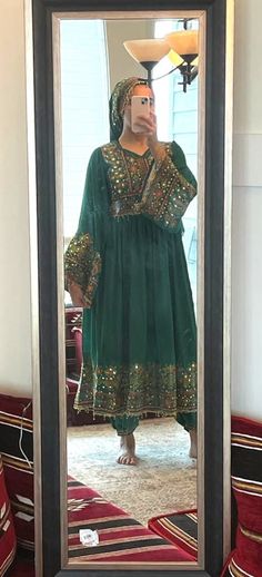 ⋆This is a complete traditional Afghan dress set⋆ This dress is the perfect outfit for any special occasion because: 🌷It is a complete set: dress, trouser, and headset.   🌷It is a lightweight material that is decorated by mirrors and embroidery.  🌷It's delicate and unique design that you can be sure no one else will have. 🌷It's expertly designed and sewn. 🌷It fits sizes small to large. Only one item in stock! Traditional Ceremonies Long Sleeve Sets With Mirror Work, Festival Sets With Mirror Work For Traditional Ceremonies, Long Sets With Mirror Work For Festivals, Traditional Long Sets With Mirror Work, Afghan Green Dress, Red Afghan Dress, Purple Afghan Dress, Folkwear Afghan Nomad Dress, Gand Afghani Dress