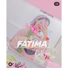 a girl is holding flowers in front of her face and looking into the mirror that says fatma