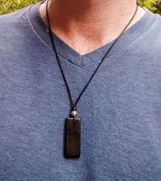 "With a beautiful glossy finish, this unique Irish Bog Oak pendant is adorned with a quality cast and lead free pewter Celtic knot bead. Bog-wood comes from ancient forests that once covered Ireland. Huge oaks and yew trees have been buried in peat bogs and preserved from decay by the acidic and anaerobic bog conditions, sometimes for hundreds or even thousands of years. The wood is usually stained by tannin dissolved in the acidic water (black for the oak and a lovely brown for the yew). Bog-wo Rectangular Black Beads Jewelry Gift, Rectangular Black Beaded Jewelry Gift, Rectangular Black Beads Jewelry As Gift, Triple Spiral, Wood Anniversary Gift, Wood Anniversary, Spiral Necklace, Old Irish, Ancient Forest