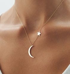 14k Solid Gold Crescent Moon and Star Sideways Necklace, Crescent Moon Star Asymmetric Necklace, Real Gold Jewellery, Celestial Necklace Material: Solid Gold Karat: 14 K (585) Approximate weight : 1,60 gram Want to Check Out More from Our Sections FİEMMA http://www.etsy.me/3ukWhje Gold Rings http://www.etsy.me/39E9NGS Gold Necklaces http://www.etsy.me/31NdjtO Gold Bracelets http://www.etsy.me/2QT9SzF Gold Earrings http://www.etsy.me/3mfSmRK Gold Pendants http://www.etsy.me/3uiXrLZ Gold Chains ht Minimalist Moon-shaped Jewelry With Star Charm, Asymmetric Necklace, Crescent Moon And Star, Gold Crescent Moon, Gold Pendants, Real Gold Jewelry, Celestial Necklace, Small Jewelry Box, Gold Bracelets