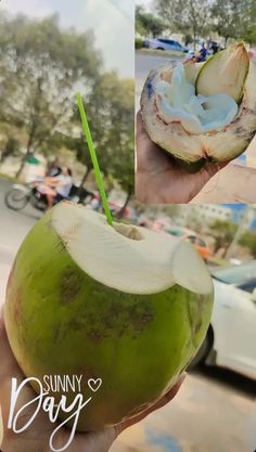 a person holding up a green coconut in their hand