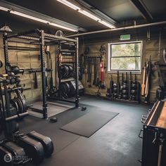 Cover your garage walls with canvas to give your home gym an army vibe. Military/Armed Services Styled Home Gym Interior in Khaki Green. AI made Home Gym inspiration and ideas made by Gymterest Gymspiration. Follow us for more content and to help you plan your home and commercial gym spaces. Home Gym Design | Commercial Gym Design | Layout & Planning | Garage Gym Ideas | Best Home Gyms | Interior Design | PT Personal Training Space | Gym Lighting and Flooring | Exercise Equipment | Strength Training | Yoga Room | Pilates | Cardio Workouts | Health and Fitness | Barn, Shed and Shipping Container Gyms Partial Garage Gym, Gym In A Shed, Workout Shed Gym, Garage Gym Paint Ideas, Garage Boxing Gym, At Home Gyms, Shed Gym, Home Gym Interior