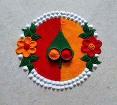 a decorative item made out of felt with flowers on it