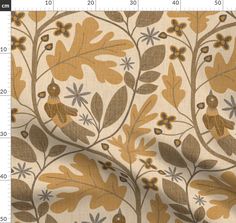 an image of a fabric with flowers and leaves in gold, brown and white colors