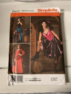 Simplicity Pattern #2851. Western Saloon girl dress pieces, gloves. Cosplay, historical period dress, wedding, etc. Complete pattern, uncut, factory folded. Sizes: R (14, 16, 18, 20) This pattern is from my personal collection of costume patterns, some used, some brand new. This pattern has not been used, it was purchased by me as new. It has been kept in storage and, therefore, the envelope does show wear. Pattern instructions and uncut pieces are intact. (see photos) Shipping is by USPS First Class. Old West Saloon Girl, Saloon Girl Dress, Simplicity Patterns Costumes, Saloon Girl Costumes, Old West Saloon, Saloon Girl, Western Saloon, Saloon Girls, Steampunk Skirt