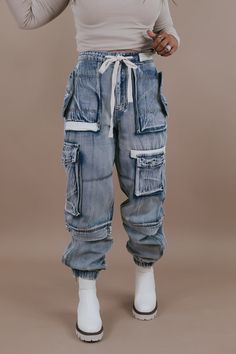 Utility Cotton Joggers, Hip Hop Denim Cargo Pants In Denim Blue, Dark Wash Utility Cargo Pants For Streetwear, Dark Wash Utility Pants For Streetwear, Streetwear Cargo Jeans In Denim Blue, Streetwear Denim Blue Cargo Jeans, Utility Cargo Jeans With Denim Material, Hip Hop Denim Cargo Pants, Denim Blue Cargo Pants With Multiple Pockets For Streetwear