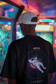 Get ready to float through the galaxy in style with our "All I Need is Space" t-shirt! Featuring a laid-back design of a guy chilling in a dinghy amidst the stars, this fun and quirky graphic tee is perfect for space lovers, dreamers, and those who just need some personal space! Whether you're a fan of sci-fi, astronomy, or just enjoy a humorous take on the cosmos, this shirt is sure to make a stellar addition to your wardrobe. Unisex fit, perfect for both men and women Available in a variety of colors and sizes High-quality, soft fabric that's comfortable for everyday wear Ideal for sci-fi fans, space enthusiasts, and anyone with a sense of humor Great gift idea for birthdays, holidays, or for anyone who loves space or quirky designs Perfect for casual wear, hanging out with friends, or l Space Graphic Tee, Space Lovers, Cool Graphic Tees, Personal Space, Quirky Design, The Galaxy, Cosmos, Party Outfit