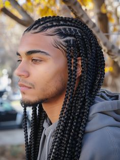 Exploring 30 Creative Braid Ideas for a Black Man Featuring Cornrows Box Styles and More Layered Box Braids, Lightskin Haircuts, Stylish Cornrows, Cornrows Box Braids, Long Hair Braided Hairstyles, Long Cornrows, Braid Styles For Men, Boy Braids Hairstyles, Cornrow Hairstyles For Men