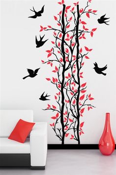 the birds are flying around the tree wall decal