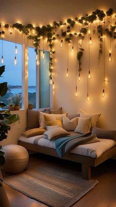 a living room filled with lots of plants and lights