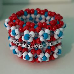 A handmade July 4th bracelet, the colors being [of course,] red, white, and blue! Blue Friendship Bracelets For 4th Of July Gift, Multicolor Round Beads Bracelet For 4th Of July, Blue Patriotic Bracelet For Friendship, Patriotic Blue Friendship Bracelets, Patriotic Multicolor Stretch Bracelet For 4th Of July, Patriotic Blue Stretch Bracelet For 4th Of July, Patriotic Blue Friendship Bracelet, Multicolor Beaded Bracelets For 4th Of July Gift, Multicolor Beaded Bracelets For 4th Of July