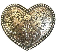 AndWest Western Womens Buckle Heart Shape Floral Antique Silver    Heart Shape Antique Silver Finish Measures: 4" x 3/4"    Womens AndWest Belt Buckle: Mount that horse with the intent to sparkle in the arena! This gorgeous AndWest belt buckle features a stunning floral carved, heart shaped, studded and rhinestones row and antique silver finish tone. Heart Belt Buckle, Cowgirl Belt Buckles, Mother Cain, Belt Ideas, Belt Buckles Men's, Heart Belt, Cowgirl Belts, Carved Heart, Western Belt Buckles