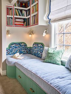 a room with bookshelves and a bed in it that is made to look like a bookcase