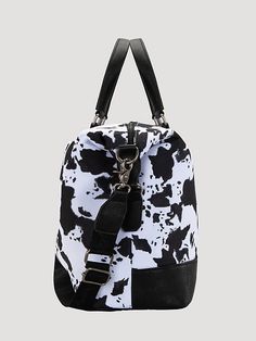 Made synthetic leather Cow print throughout Wrangler logo on the front Top zipper closure Inside includes zippered pocket and compartment Trolley sleeve and a zippered pocket on the back Detachable and adjustable cross body strap (35"-58.8") 18"L x 7.5"W x 14"H (Hand drop: 4.8") Trendy Duffle Bag With Zipper For Daily Use, Trendy Everyday Weekender Bag With Zipper Closure, Trendy Everyday Weekender Bag With Zipper, Casual Black Weekender Bag With Leather Trim, Casual Travel Bag With Leather Trim, Casual Travel Bag With Leather Trim For On-the-go, Casual Black Travel Bag With Leather Trim, Casual Bags With Zipper Closure And Adjustable Strap, Casual Duffle Bag With Zipper Closure For On-the-go