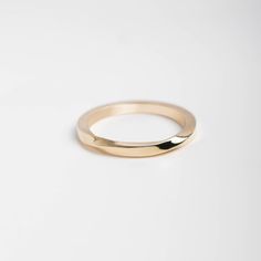 Twisted Wedding Band Ring for Women 14K Solid Gold Mobius - Minimalist Stacking Gold Ring  A handmade wedding ring of 14k solid gold with softened edges for comfort. Engrave the ring with no extra cost. 100% handcrafted with love! D E T A I L S ● Metal: 14K solid gold, 14K white gold ● Dimensions: measures 2.1 mm in width x 2.2mm thick R I N G ∙ S I Z I N G For General Reference: ● we use standard US Ring Sizing ● an average women's ring finger is size 6-7 and an average men's ring finger is siz Classic Wedding Rings In Recycled Gold, Modern 14k Gold Engraved Ring For Wedding, Minimalist Polished Promise Band, Wedding Rings In Recycled Yellow Gold, Timeless Wedding Rings In Recycled Gold, Recycled Yellow Gold Wedding Rings, Recycled Yellow Gold Rings For Wedding, Wedding Rings In Polished Recycled Gold, Wedding Rings In Recycled Gold With Polished Finish